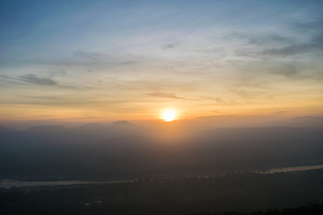 the rising sun with colorful misty morning in rocks