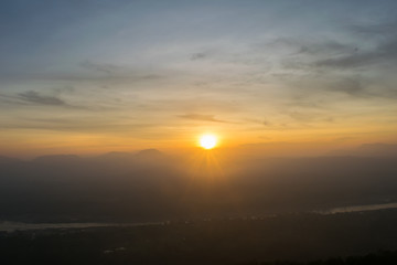 Obraz premium the rising sun with colorful misty morning in rocks