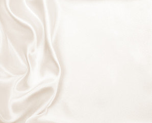 Smooth elegant golden silk or satin luxury cloth texture as wedd