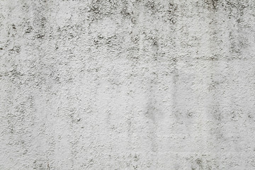 wall is concrete with a textured surface