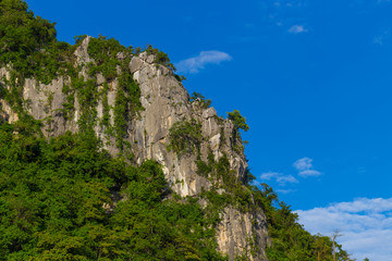 Fototapeta na wymiar Limestone mountains and blue sky