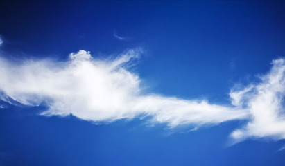 The blue sky and cloudy shape texture.