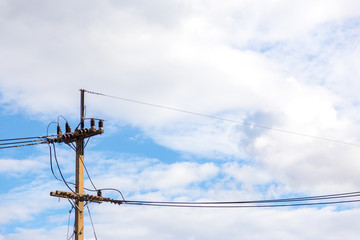 Power poles with wires tangled wires.