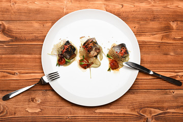 dish of fish on plate