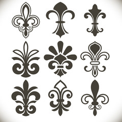 Black fleur de lis shapes vector set © More Images