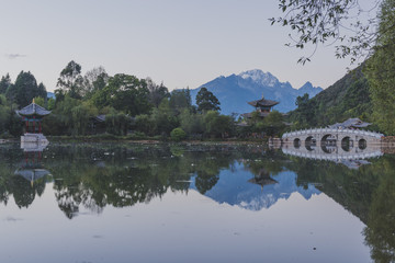 Black Dragon Pool and Jade Snow mountain background at north of the Old Town of Lijiang in Yunnan province, China.