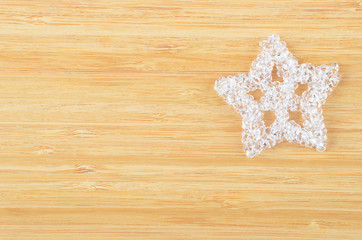 Fototapeta na wymiar Decorative plastic snowflake