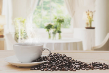Coffee on wooden table in coffee shop