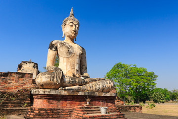 Ancient Buddha Statue at Sukhothai historical park, Thailand.