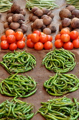 Tomatoes Green Beans and Roots beautifully displayed
