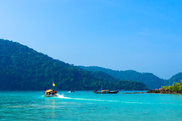 Fototapeta na wymiar Long tail boat at Surin islands, Phang-nga Thailand.