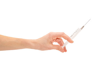 Female hand holding syringe. Isolated on white.
