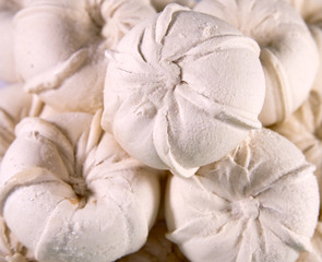 Frozen hinkali with meat before cooking