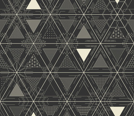 Seamless vector thin line geometric pattern of snowflakes and triangles. Hipster style. The white lines on a black background.