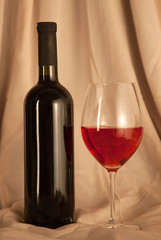 bottle of wine and glass on the table