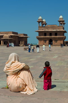 Tourists at Fatehpur Sikri 17th Century historic palace and city of Mughals at Agra, Northern India