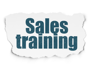 Advertising concept: Sales Training on Torn Paper background
