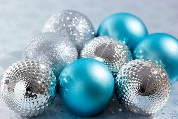 New Year background with blue Christmas balls.