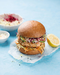 Burger with salmon and avocado