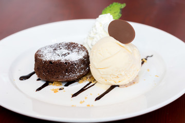 Chocolate Fondant Served with Vanilla ice cream and wipping crea