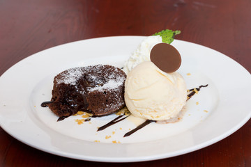 Chocolate Fondant Served with Vanilla ice cream and wipping crea