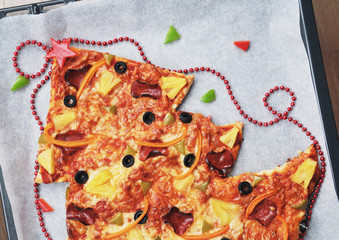 Christmas tree pizza for Christmas dinner, top view blank space for text