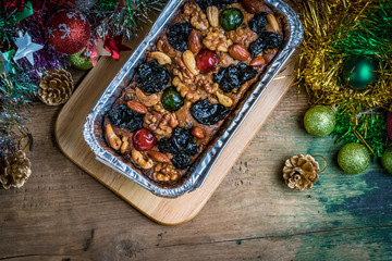 Fruit cake on wooden board