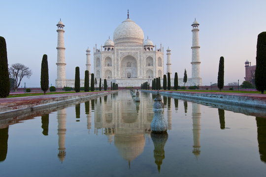 The Taj Mahal mausoleum southern view with reflecting pool and cypress trees, Uttar Pradesh