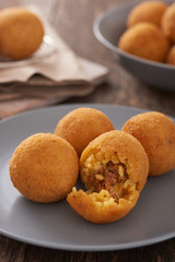 Arancini (deep fried rice balls with meat) Typical Sicilian street food