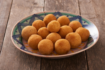 Arancini (deep fried rice balls with meat) Typical Sicilian street food