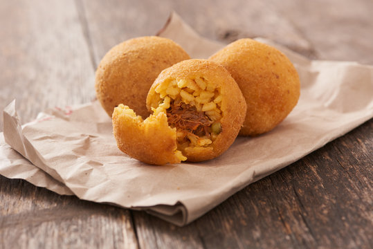 Arancini (deep fried rice balls with meat) Typical Sicilian street food