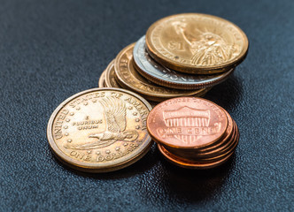 dollar coins stack on black