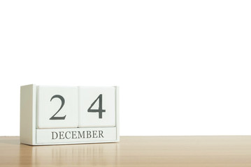 Closeup surface white wooden calendar with black 10 december wor
