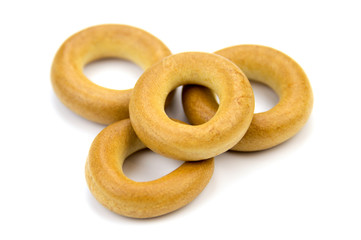 Wooden rustic table with national russian bagels. A group of bagels on a blue wooden table, top view