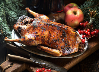 grilled duck with apples on a plate. rustic style