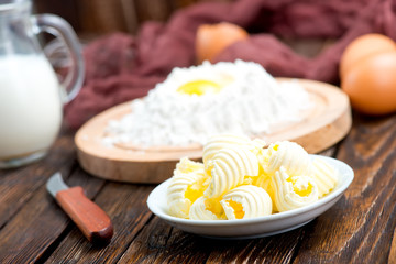 Fototapeta na wymiar flour,milk, butter and eggs