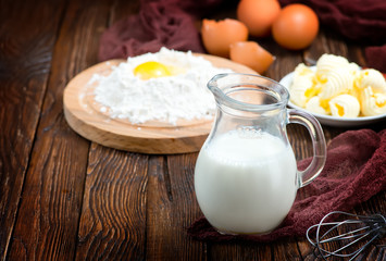 Obraz na płótnie Canvas flour,milk, butter and eggs