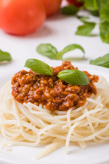spaghetti bolognese on white table