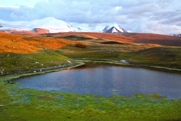 Sunset view at lake on famous Plateau Ukok, Altai, Russia