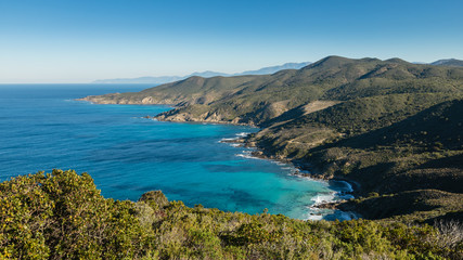 Turquoise sea on coast of Desert des Agriates in Corsica