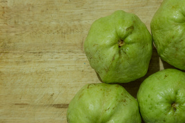 Guava fruits put on wooden background