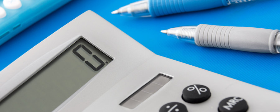Calculator and blue background