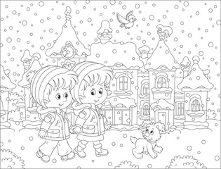Friendly smiling girl and a boy talking and going together on the street of a snow-covered town