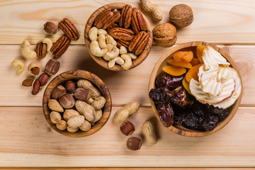 Fototapeta na wymiar Selection of dried fruits and nuts as symbols Tu Bishvat
