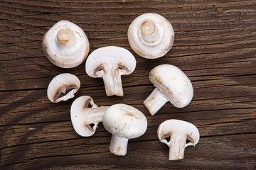 Mushrooms on wooden background