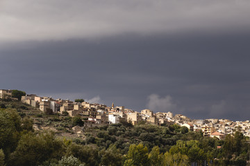 Fototapeta na wymiar Postcard from Sicily, landscape view with heavy storm clouds