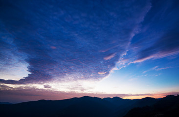 Sunset with sun rays, sky with clouds and sun...