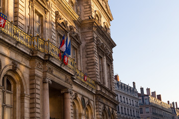 Fototapeta na wymiar Townhall in lyon with french flag