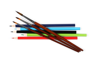 brushes painting and color pencils isolated on white