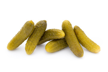 Marinated pickled cucumbers isolated on the white.